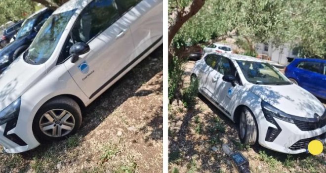 Umjesto na skupštini u Neumu, službeni automobil Ureda pravobranitelja snimljen na plaži u Hrvatskoj